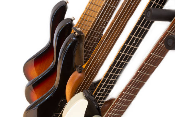 istock Various electric guitars in a row isolated on white background 1190463032