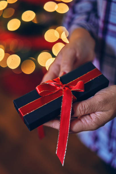 istock Christmas Presents and Holiday Lights 1190463647