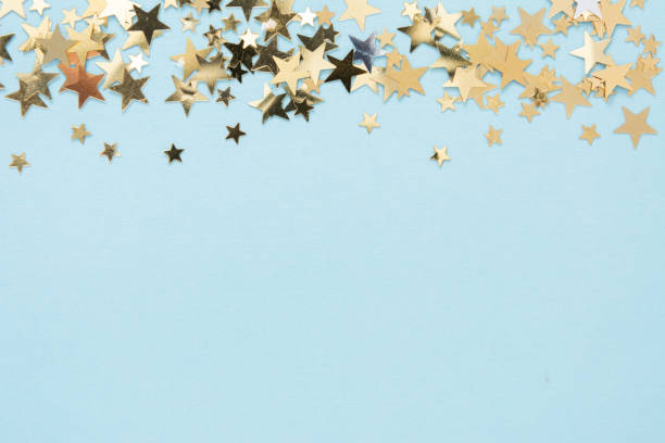 istock Star shaped golden glitter abstract background 1190464654