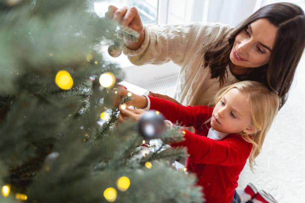 istock Pleased lady looking at the coniferous tree 1190465095