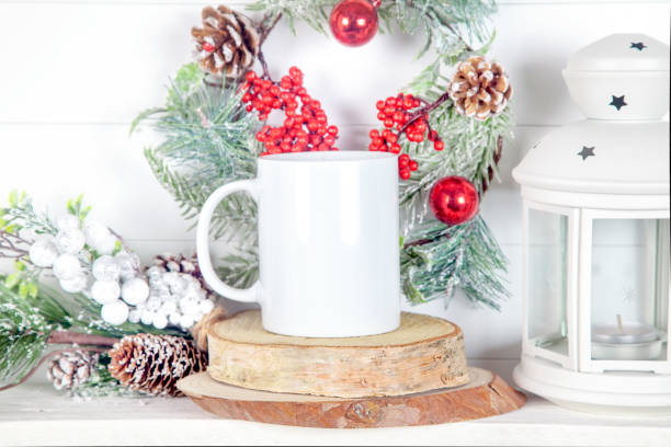 istock mug mockup for design show - mug  with fir branches, cones and lantern 1190465792