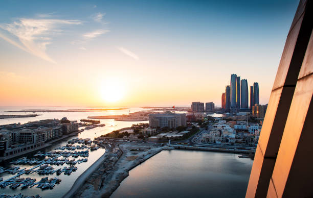 istock Sunset over Abu Dhabi skyline and the downtown modern buildings view 1190472924