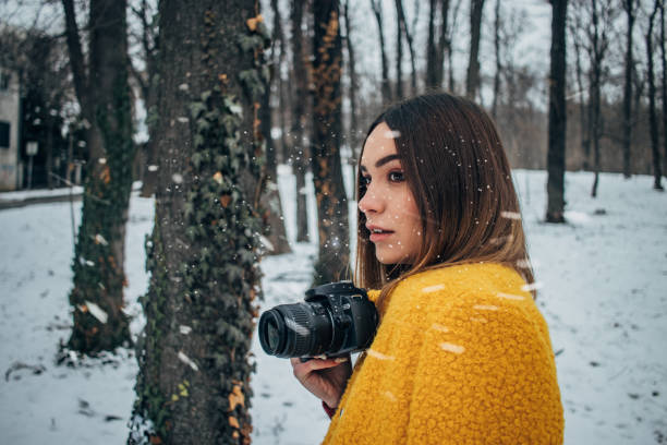 istock Charming female photographer 1190474200