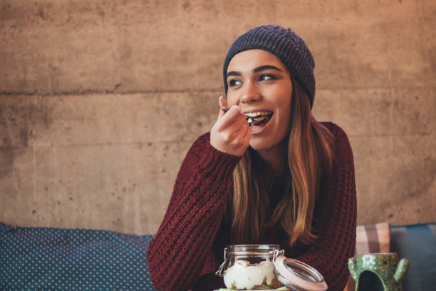 istock Woman is eating healthy breakfast 1190475457