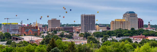 Colorado Springs Ballons Colorado Springs during the ballon lift off. Colorado Springs is a home rule municipality that is the largest city by area in Colorado as well as the county seat and the most populous municipality of El Paso County, Colorado, United States. Colorado Springs is located in the east central portion of the state. It is situated on Fountain Creek and is located 60 miles (97 km) south of the Colorado State Capitol, Denver. colorado springs photos stock pictures, royalty-free photos & images