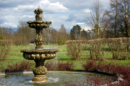 A Fountain in the Italian Gardens in Hever Castle, Hever, Kent, England.  Hever Castle was the sometimes residence of Anne Boleyn, one of the wives of Henry VIII.