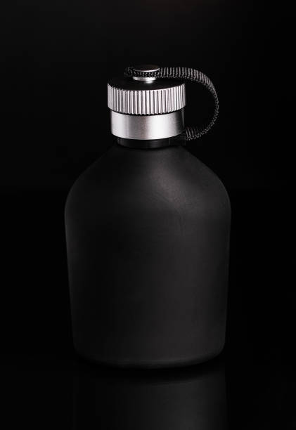 istock Military style water bottle in black background 1190489170