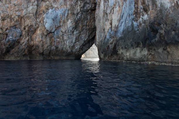 istock Stone arch above the sea in Sardinia 1190491680