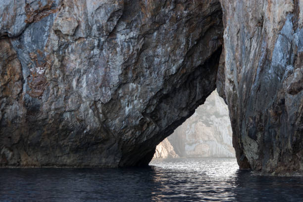 istock Stone arch above the sea in Sardinia 1190492080