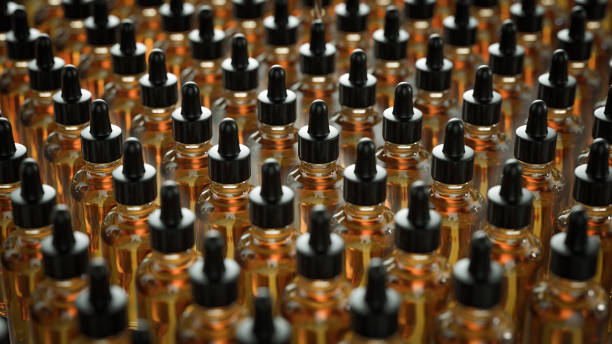 Cannabinoid oil in bottles. Treatment of diseases with organic and natural ingredients Cannabinoid oil in bottles. Treatment of diseases with organic and natural ingredients - İmage cannabinoid stock pictures, royalty-free photos & images