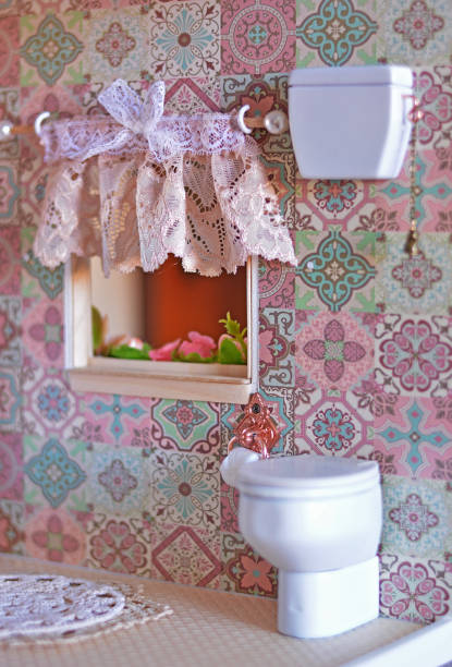 istock Dollhouse bathroom, miniature toilet with window 1190500740