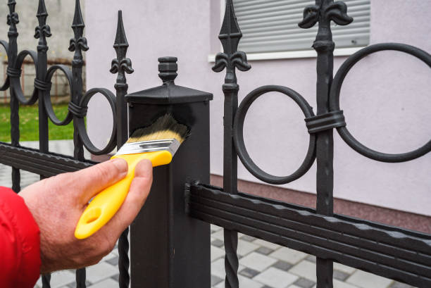 painting a fence