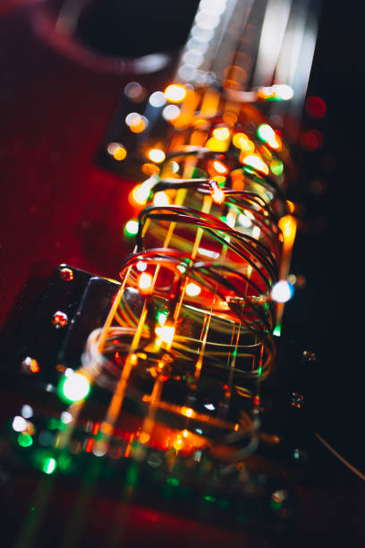 istock electric guitar with festive Christmas lights 1190505029