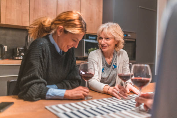 Family talking at dining table in the evening