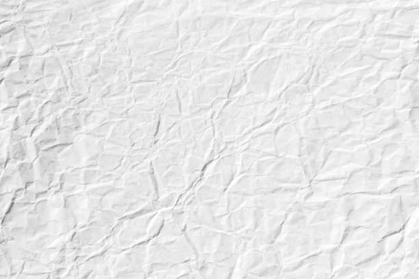 istock Crumpled white paper texture background with wrinkle 1190506967