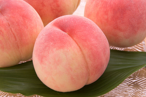 Ripe peaches on a plate