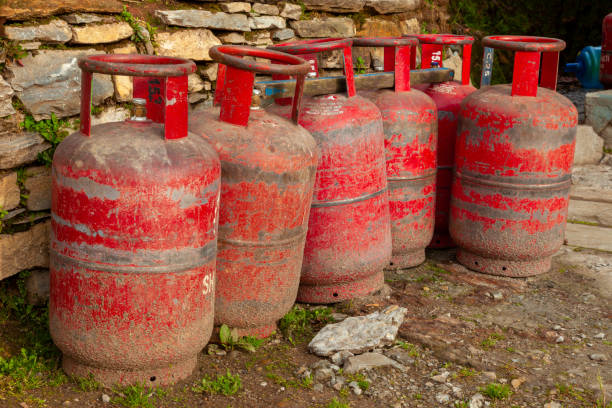 Old LPG tanks. Old LPG tanks used in the tea house along the trail in Himalayas region. liquefied petroleum gas photos stock pictures, royalty-free photos & images