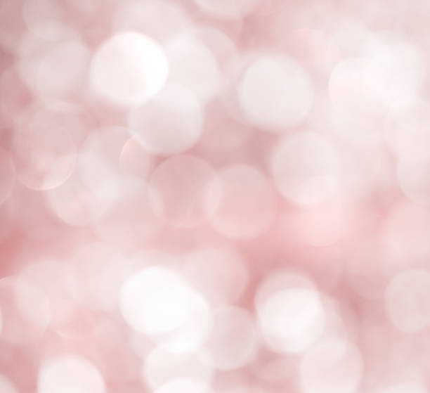istock Light bokeh sparkle glitter abstract white patterns in Natural garden background 1190525979