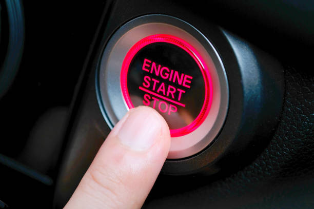 istock Pressing the car start button. Concept of transportation and technology 1190530515