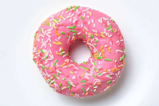 istock Pink donut on the white background. Close up 1190532422
