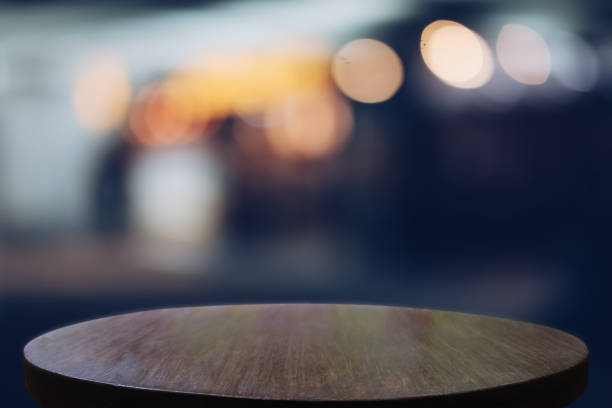 istock Empty wooden table with blurred city night background,product display montage Concept,Template mock up for display of product.Mock up for display or montage of product,Business presentation 1190532566