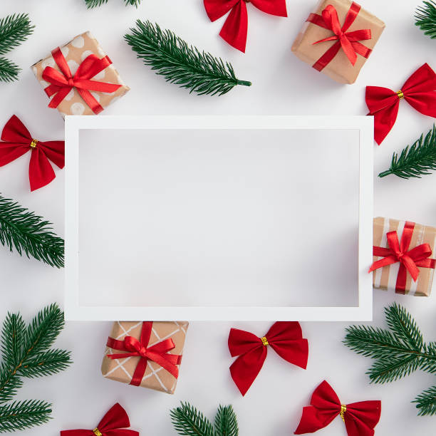 istock Christmas tree branch and red bow decoration 1190533409