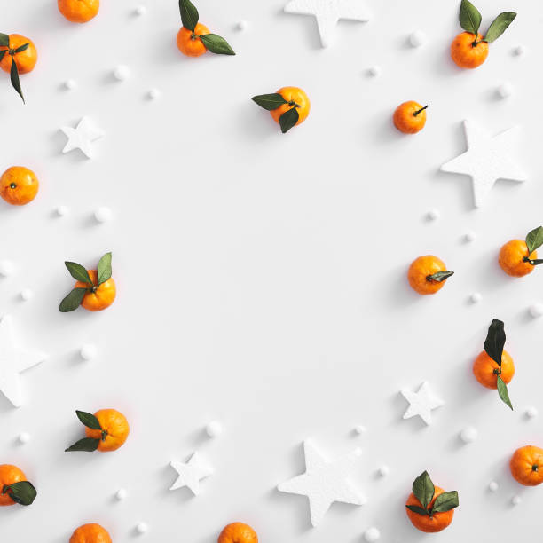 White star and tangerine over white backdrop