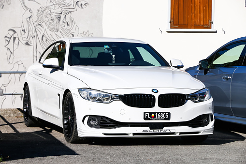 Oloron-Sainte-Marie, France - 25 March, 2024: A BMW iX electric car in a parking lot