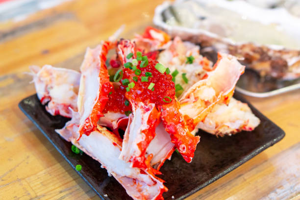 King crab lags. King crab lags with salmon fish roe topping garnish with spring onion garnish. opah photos stock pictures, royalty-free photos & images