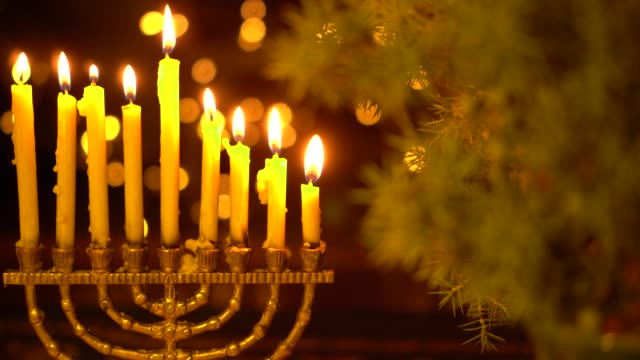 The eighth Night of Hanukkah. Eight lights in the menorah