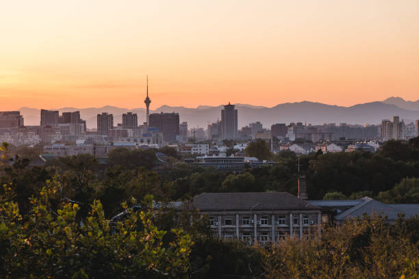 istock Panoramic view of Beijing from a viewpoint at sunset, on a clear day, China 1190544529