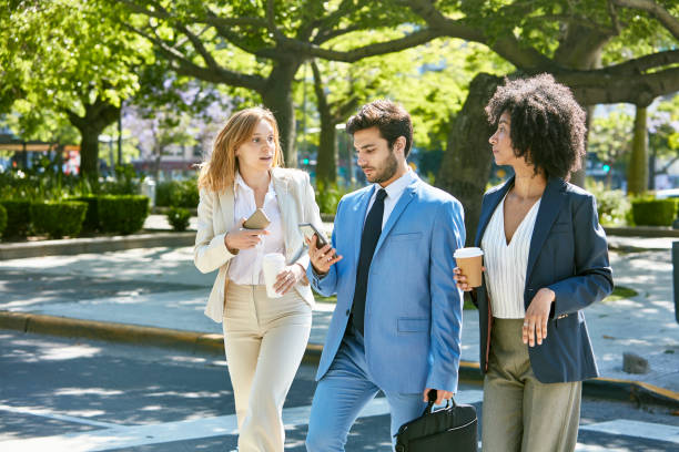 istock Businesspeople Walking Back to Office after Coffee Break 1190547825