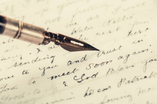 istock fountain pen on paper with ink text closeup 1190552719