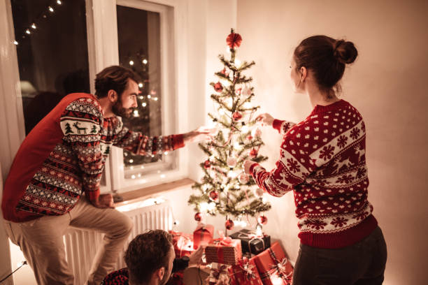 istock friends exchanging gifts for christmas 1190554308
