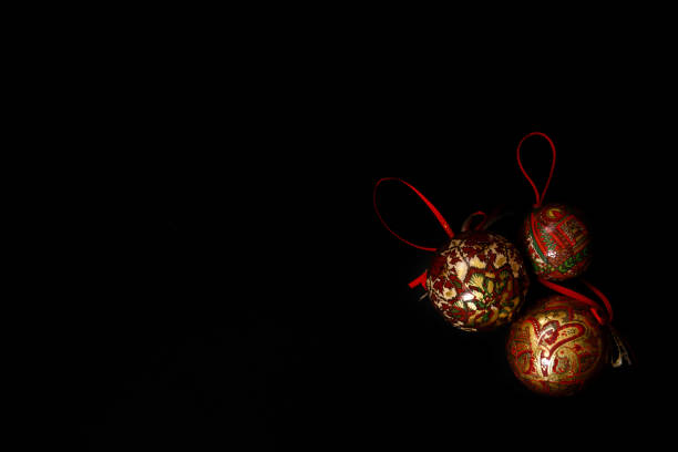istock vintage christmas balls on black background 1190555517