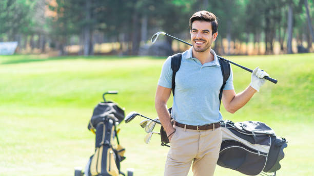 istock Male golfer standing on golf course 1190556975