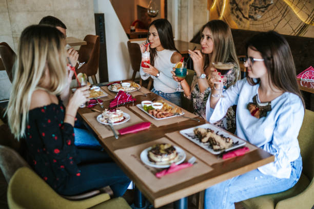 istock Friends eating at restaurant 1190559933