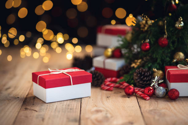 istock Christmas gift- Pine cones and branches  On the wood- 1190561089
