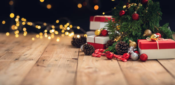 istock Christmas gift- Pine cones and branches  On the wood- 1190561102