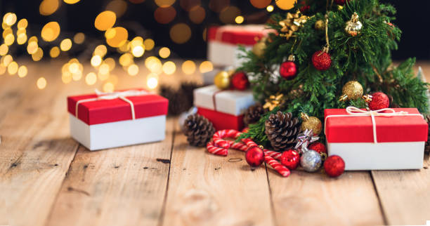 istock Christmas gift- Pine cones and branches  On the wood- 1190562685