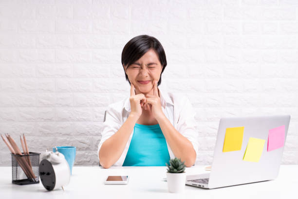 istock Happy woman sitting at home office working using computer laptop 1190571243