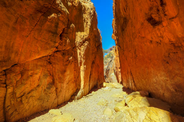 An iconic landmark in Central Australia: Standley Chasm in West MacDonnell Ranges, a natural geological gorge in dry season in the Australian Outback landscape, Red Center in Northern Territory.
