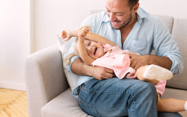 istock Young father playing with his little girl 1190573722