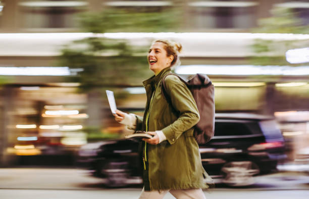 istock Young Tourist Exploring the Night City, Blurred Motion 1190575209