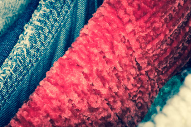 istock Fluffy colorful clothing in a wardrobe 1190577437