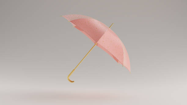 istock Pink and Gold Umbrella with Gold Raindrops Leaning Right 1190578443