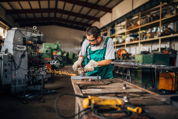 istock Man grinding in factory workshop 1190579270