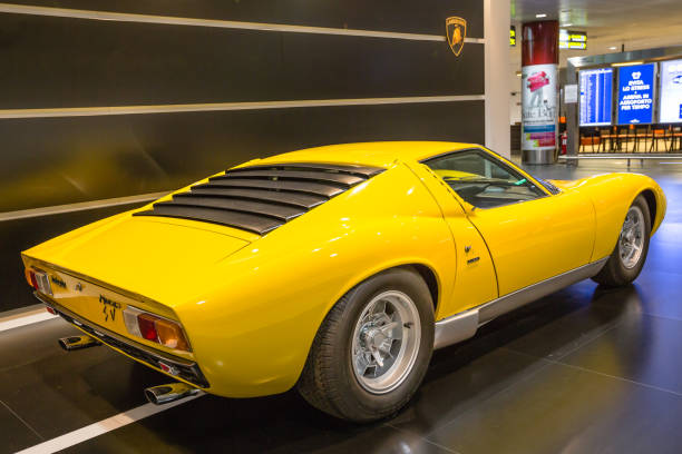 Bologna airport, Italy - June 16, 2014: backside view of a rear mid-engined Lamborghini Miura SV car on exhibition in Bologna airport. A supercar produced between 1966 and 1973.