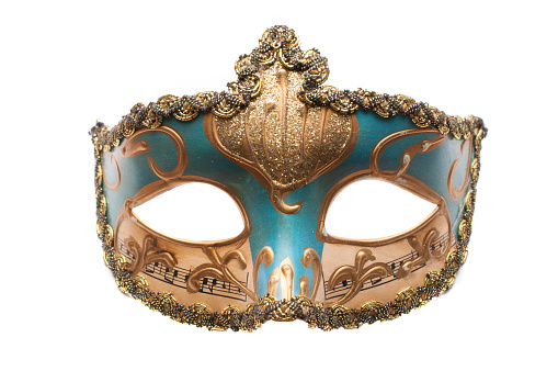 Máscara de teatro veneciano azul con notas musicales y decoraciones de oro aisladas sobre fondo blanco photo