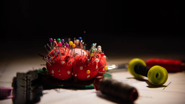 istock Close up sewing pincushion with spools. 1190586006